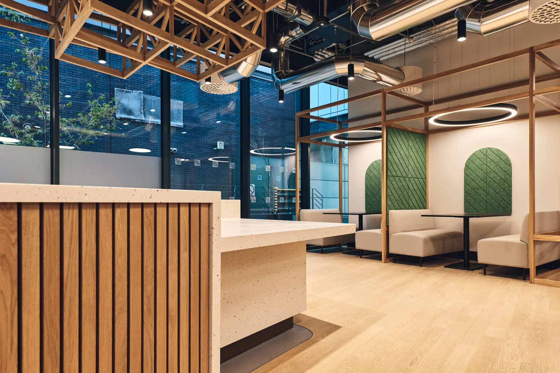 Contemporary commercial workplace reception with bespoke timber joinery