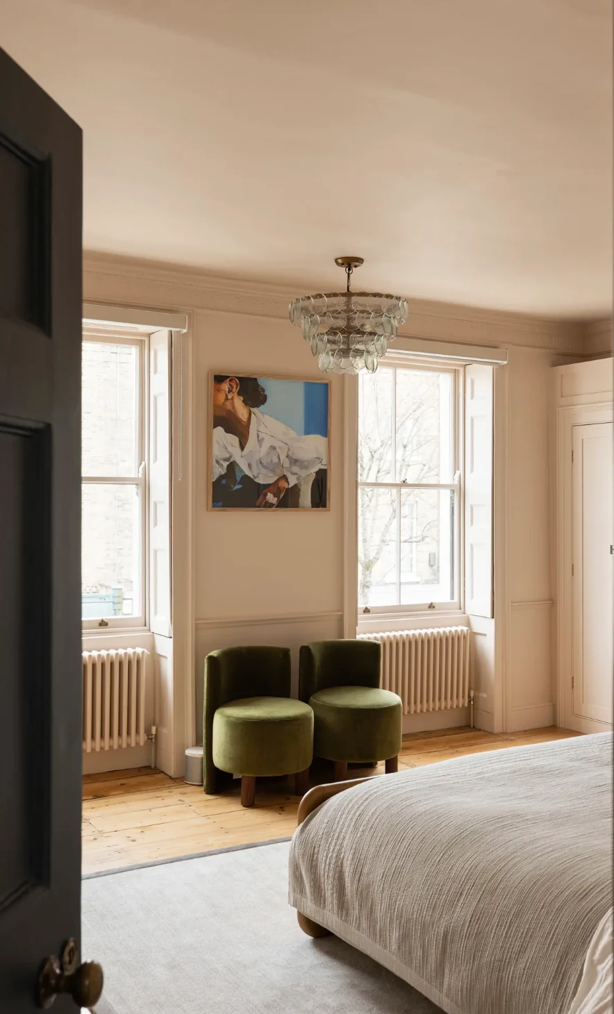 Prime residential bedroom with period windows, timber floor and bespoke decorative finishes